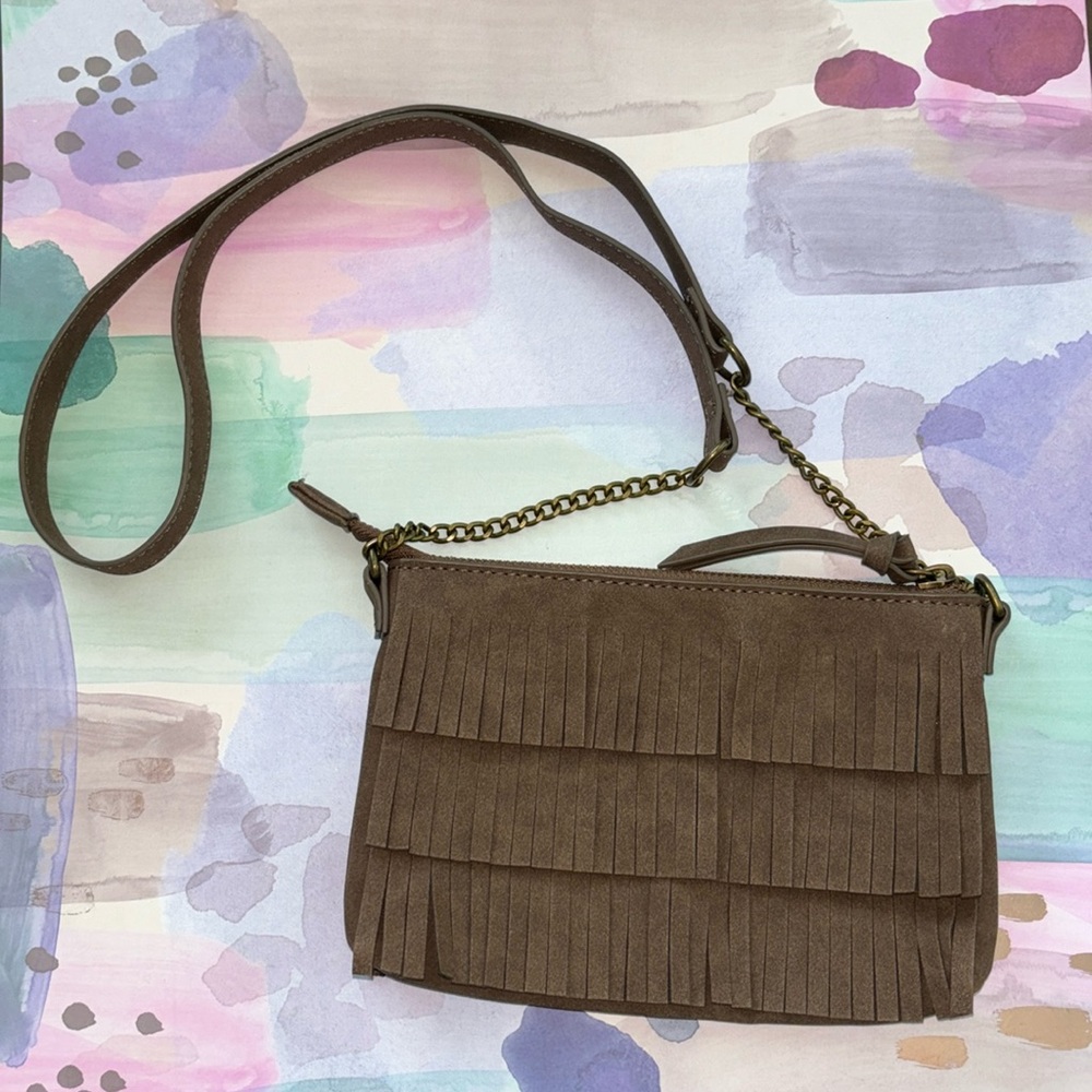 Brown fringe small purse. Feels like a soft leather. Bronze detail chain. NWOT